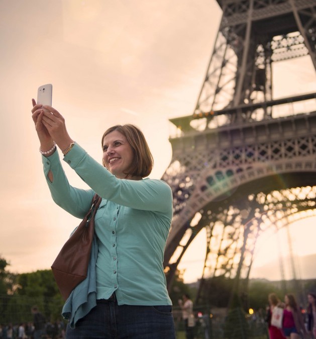 Mature Woman Taking A Selfie With The Eiffel Tower Paris