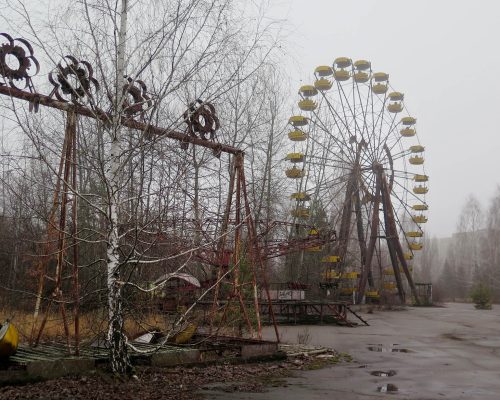 The swings and ferris wheel remain in an amusement park that was scheduled to open on May 1, 1986, for the Soviet May Day celebrations in Pirpyat, Ukraine. It never opened, as the Chernobyl disaster happened on April 26, 1986, a week before the opening.