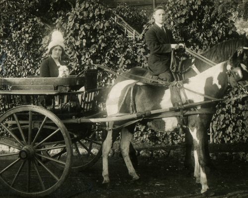 RUSSIA - CIRCA  1900s:  Vintage photo shows man and woman in a horse cart.