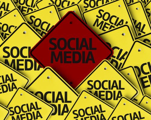 Social Media written on multiple road sign