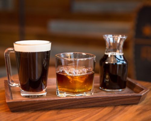 Barrel Aged Con Crema and Barrel Aged Cold Brew with Starbucks Whiskey Barrel-Aged Sulawesi photographed at the Starbucks Reserve Roastery on March 2, 2017. (Joshua Trujillo, Starbucks)